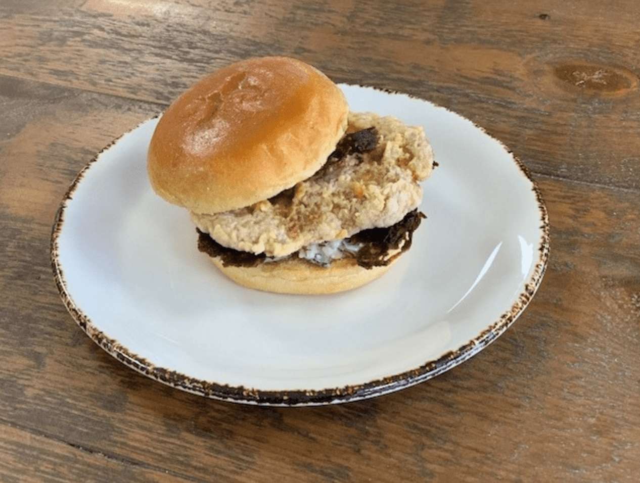 Southern style Seitan Burger, Caramelised Onion Crisps, Ranch Cucumber