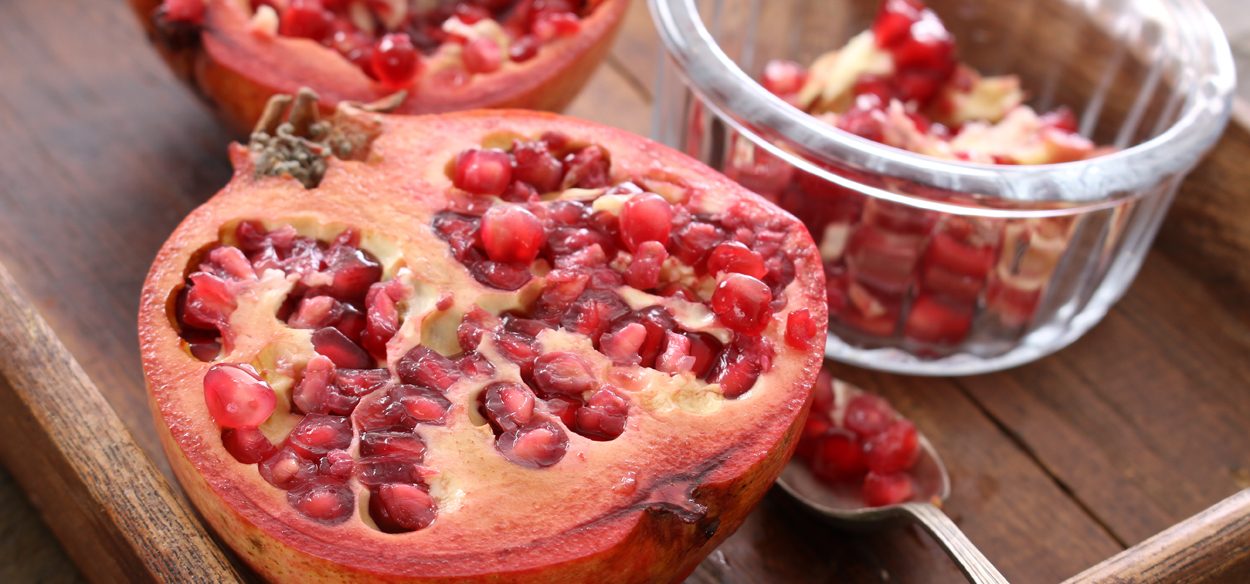 Pomegranate being prepared